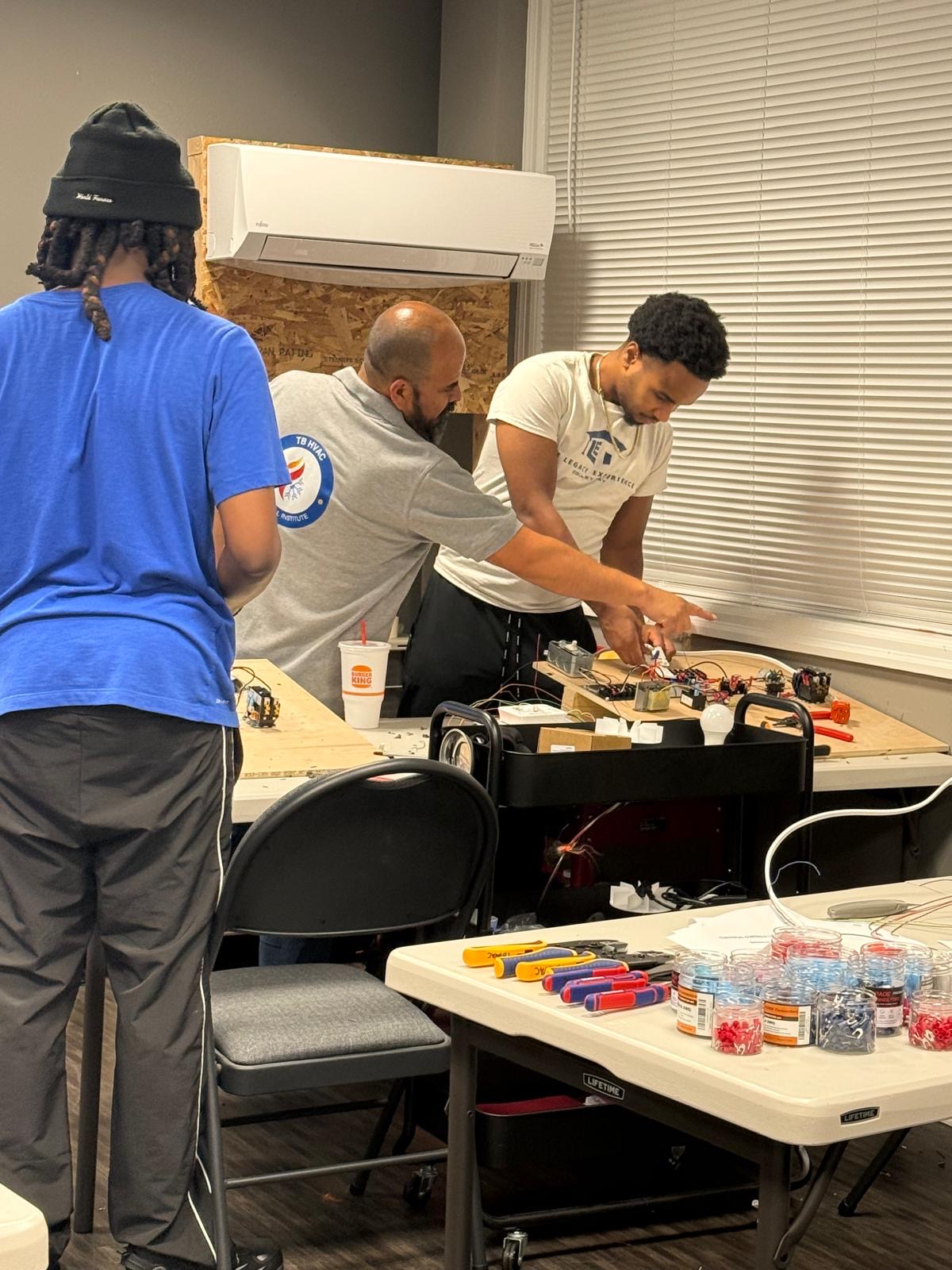 Instructor demonstrating HVAC wiring
